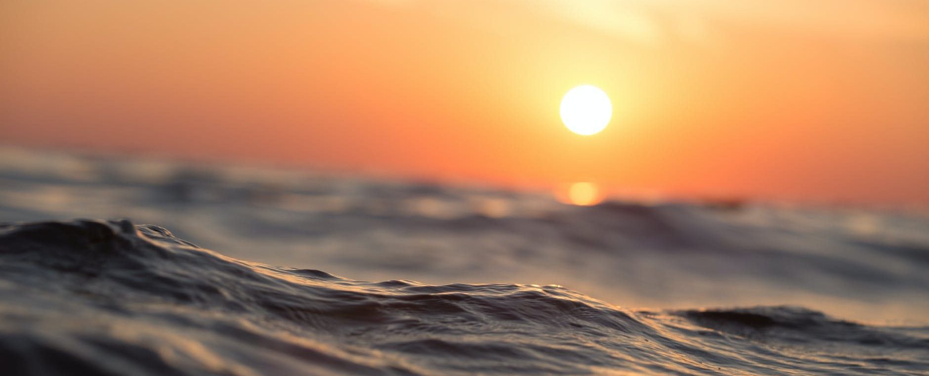 body of water during golden hour