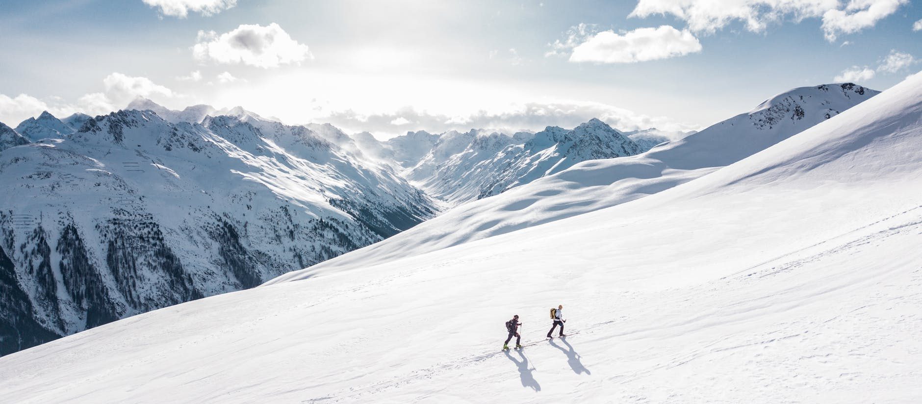 two man hiking on snow mountain