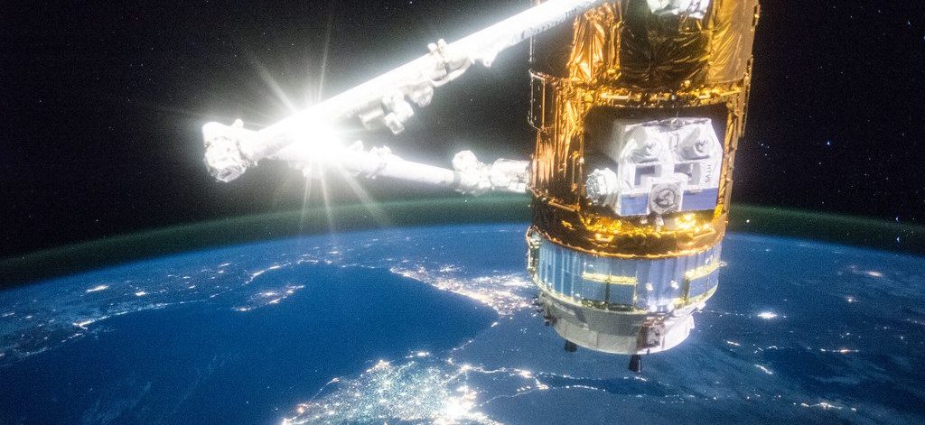 Japan's HTV-5 cargo craft is illuminated with the Nile river below