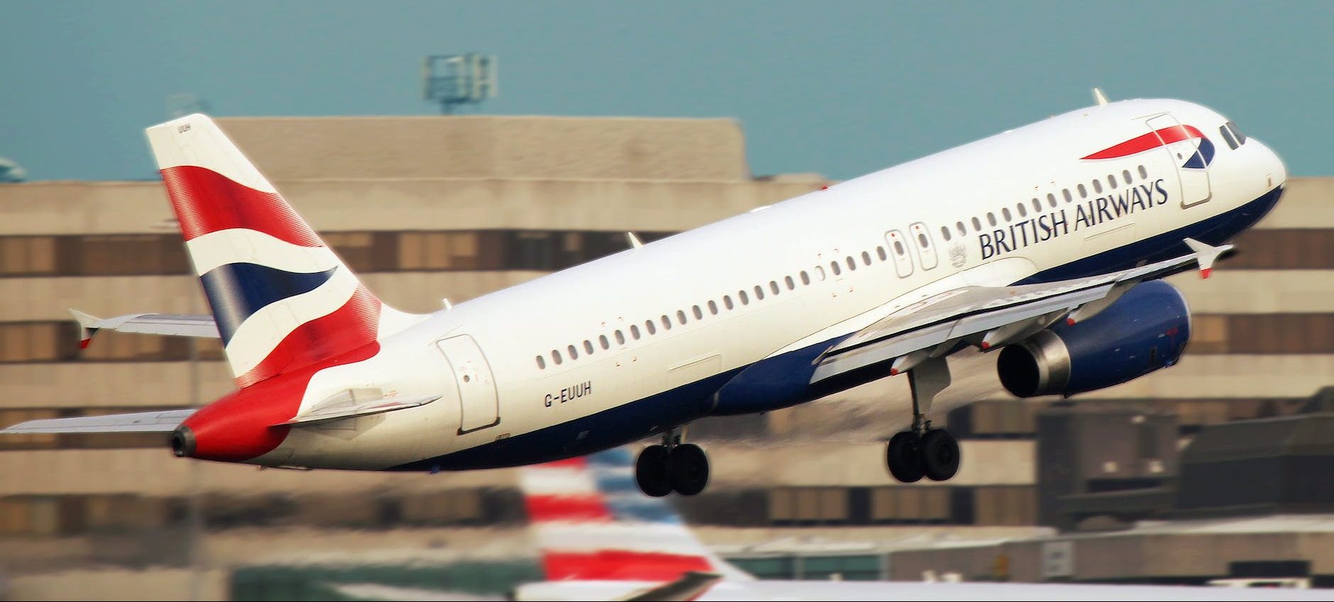 white british airways taking off the runway