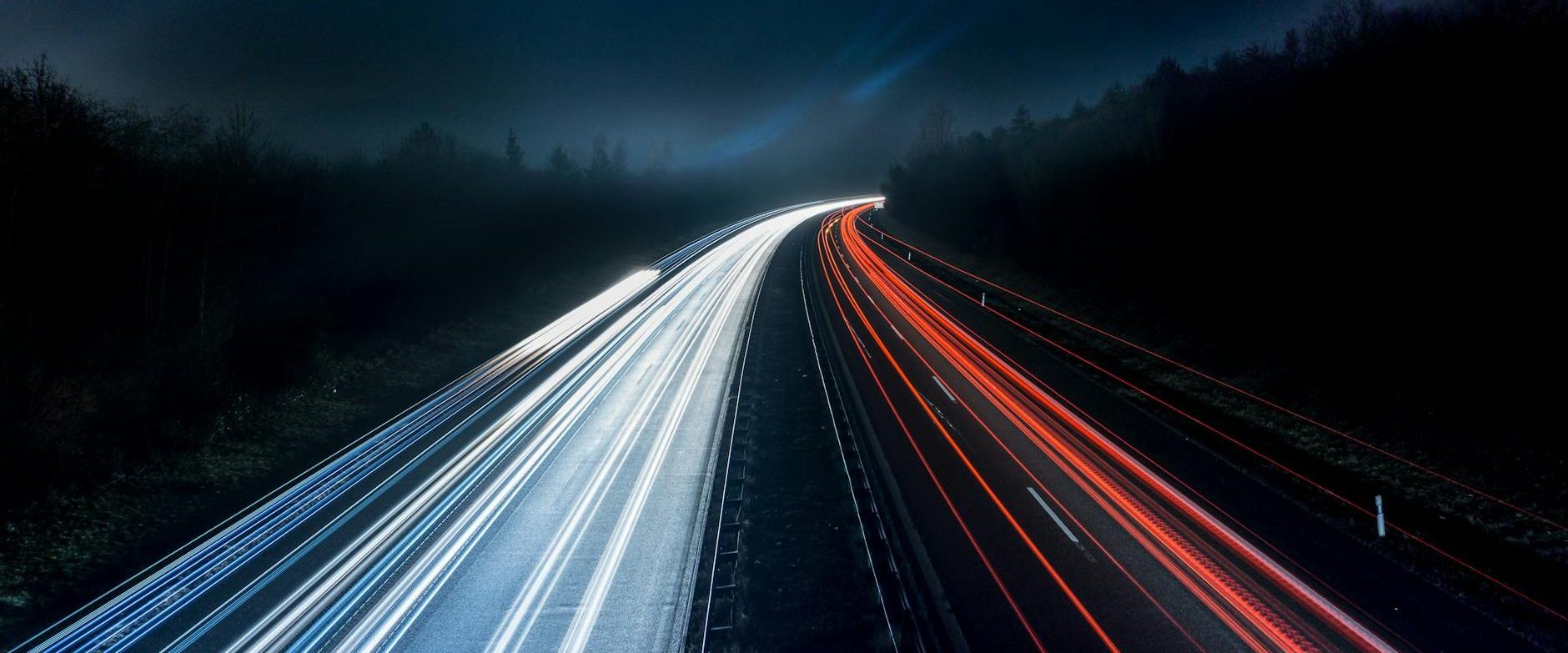 light trails on highway at night