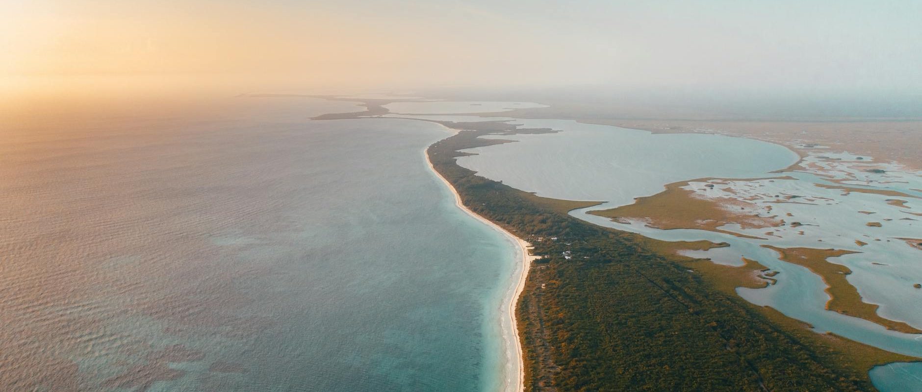 aerial view of beach during sunset